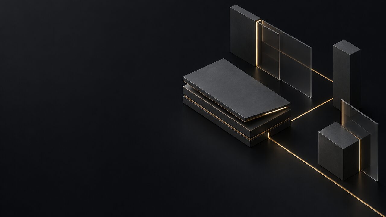 Stacked graphite slabs with brass edges like closed notebooks